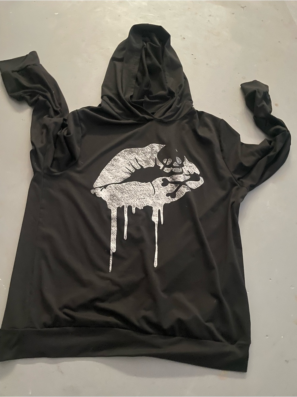 Black Hooded Sweatshirt with Dripping Lip Skull Graphic